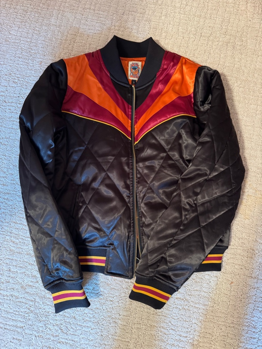 Women's Quilted Black Bomber Jacket with Red & Orange Chevron